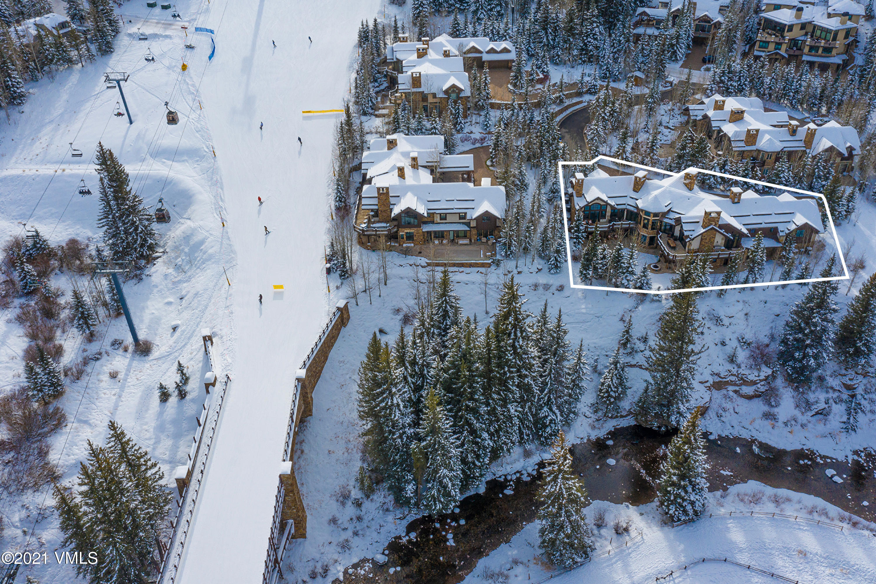615 Forest Place Vail, CO 81657 - Photo 2 of 56 an aerial view of a house with a yard