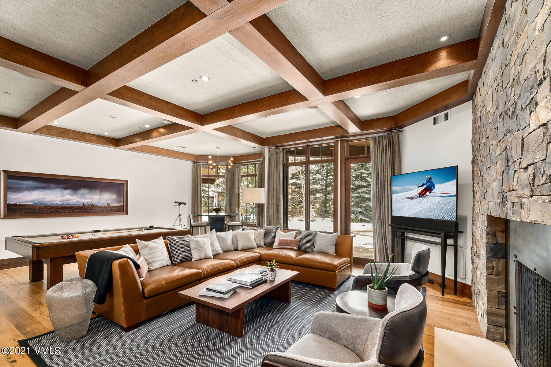 615 Forest Place Vail, CO 81657 - Photo 27 of 56 a living room with fireplace furniture and a large window