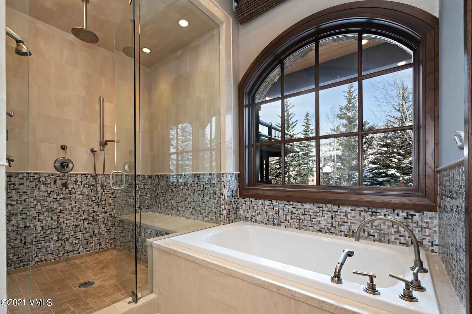 615 Forest Place Vail, CO 81657 - Photo 37 of 56 a bathroom with a bathtub and a shower