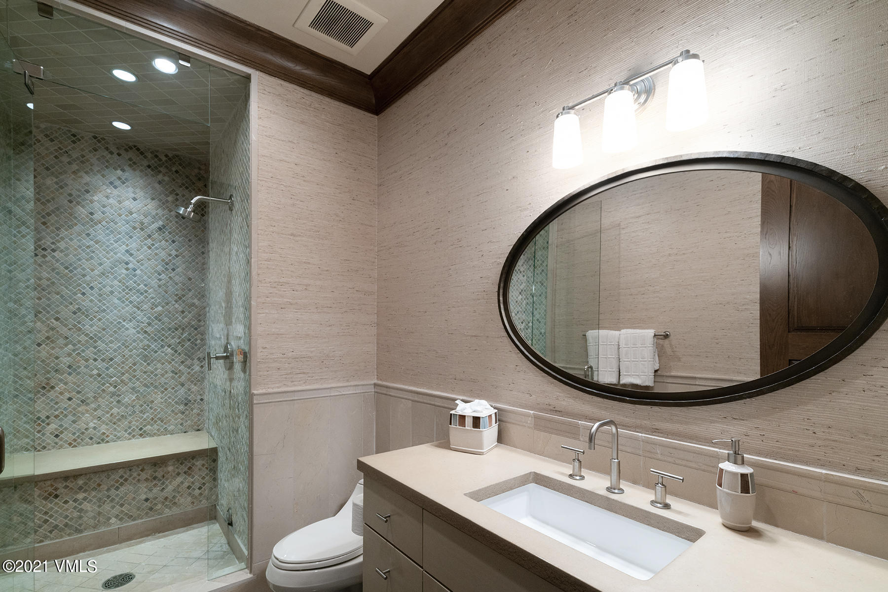 615 Forest Place Vail, CO 81657 - Photo 39 of 56 a bathroom with a sink a toilet and a mirror