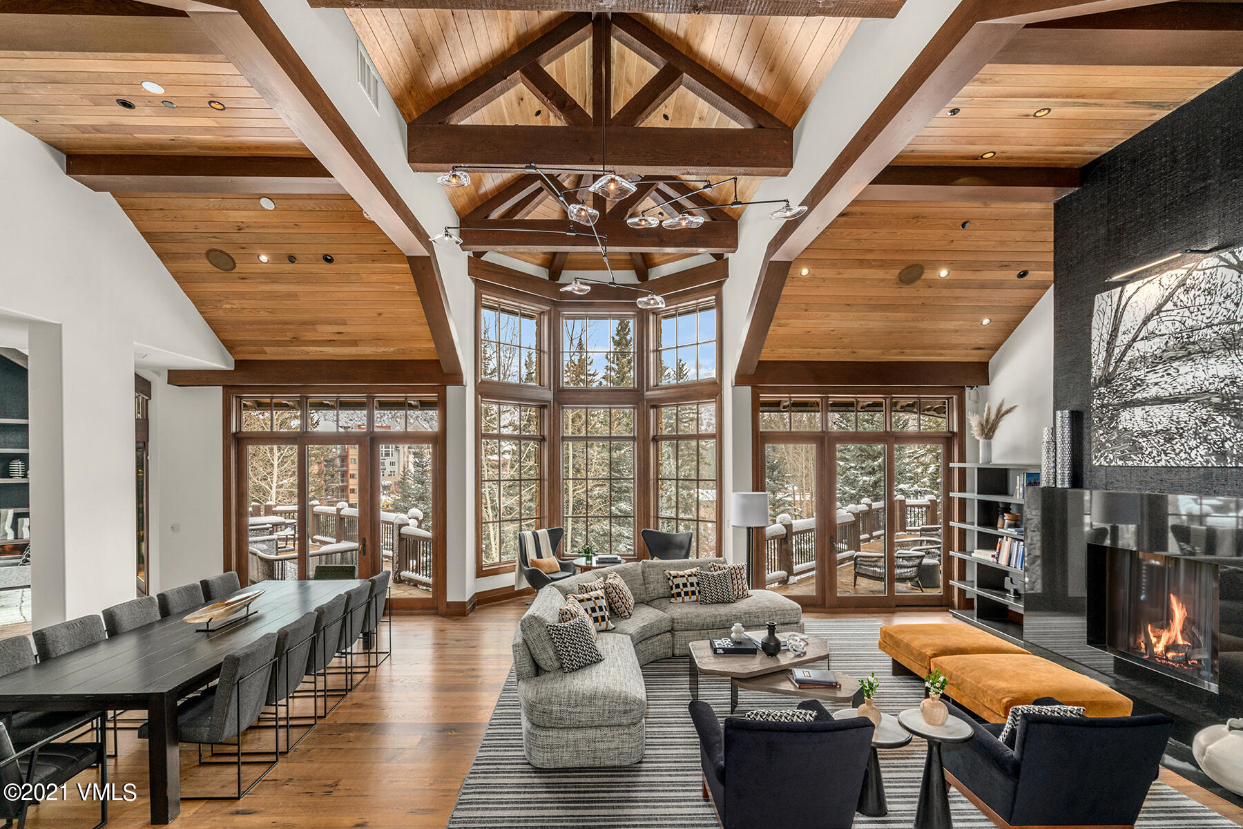 615 Forest Place Vail, CO 81657 - Photo 4 of 56 a living room with furniture and large windows