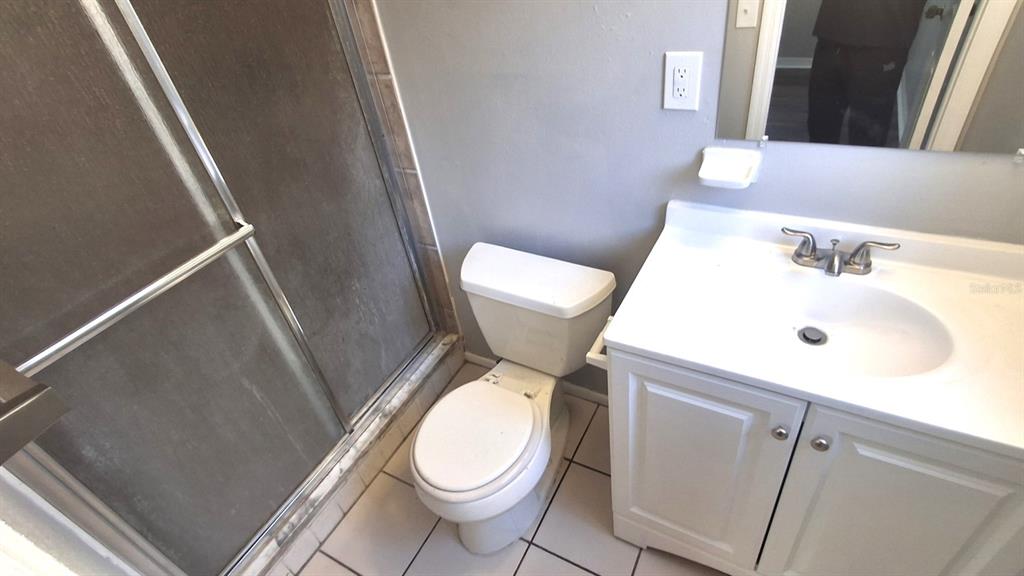 4720 Lighthouse Circle Orlando, FL 32808 - Photo 13 of 16 a bathroom with a sink and toilet