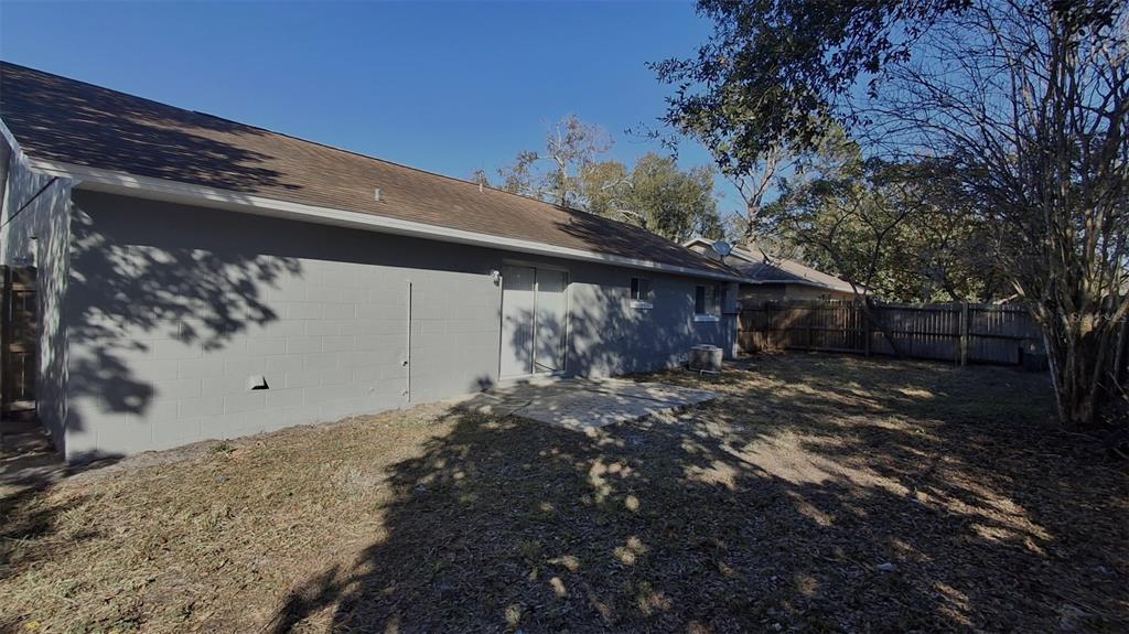 4720 Lighthouse Circle Orlando, FL 32808 - Photo 15 of 16 a view of a house with a yard