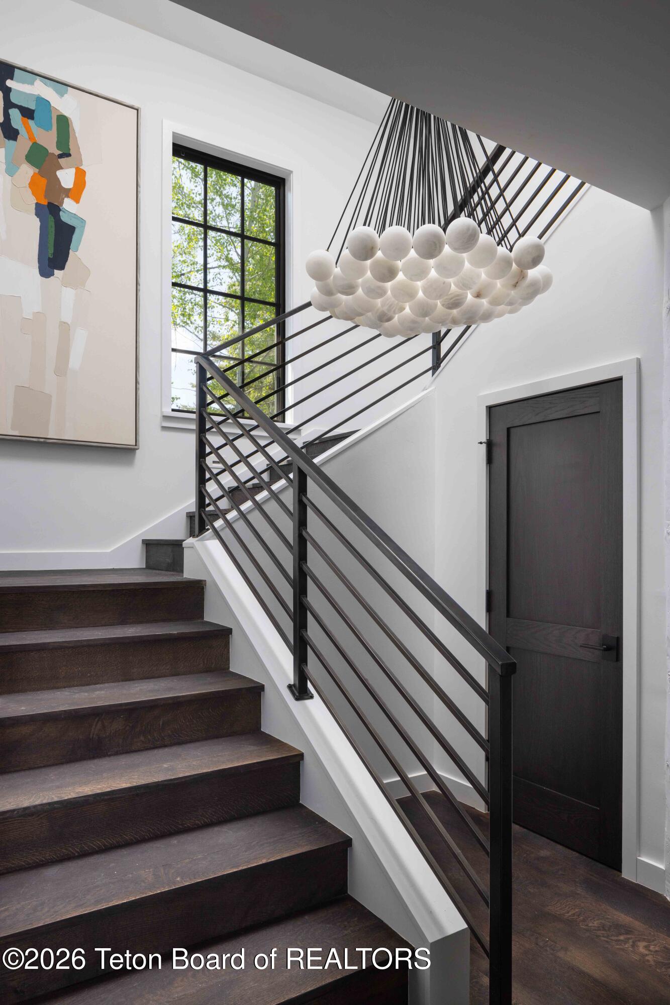 185 Swan Road Jackson, WY 83001 - Photo 17 of 48 Main Staircase