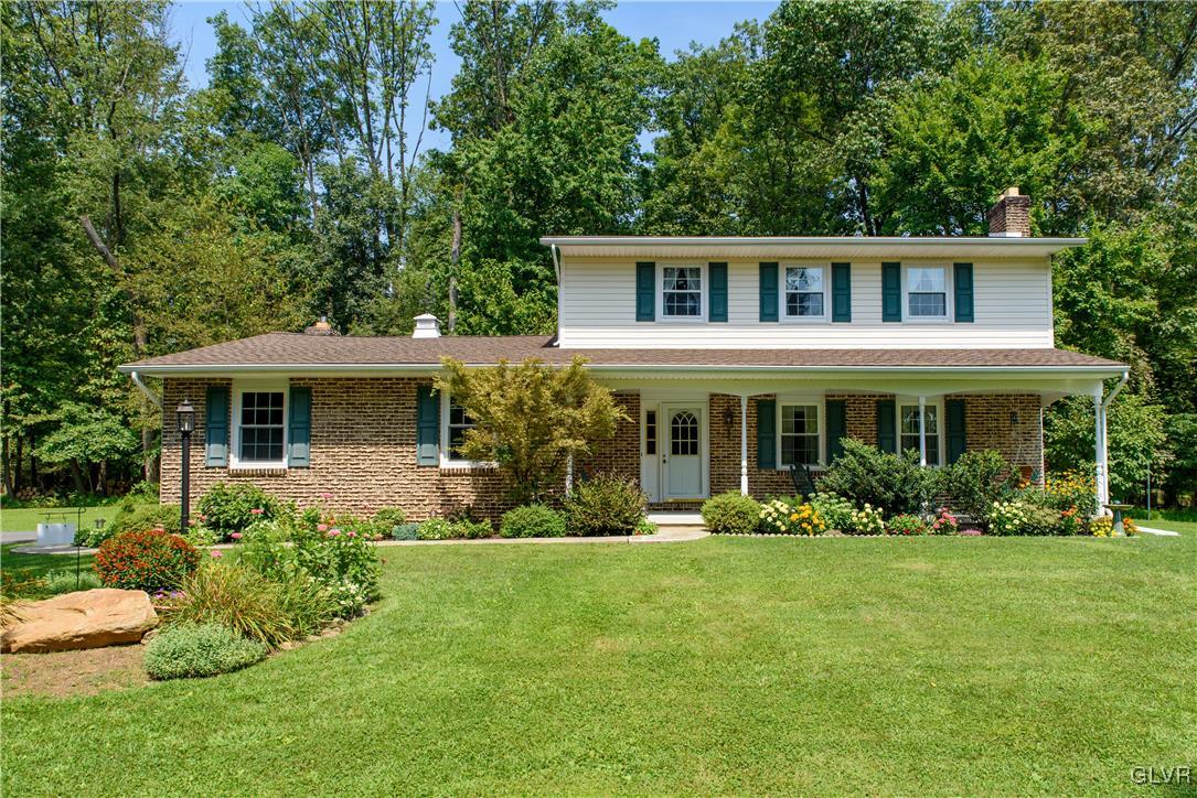 2186 East Best Road Bath, PA 18014 - Photo 2 of 40 a front view of house with yard outdoor seating and green space