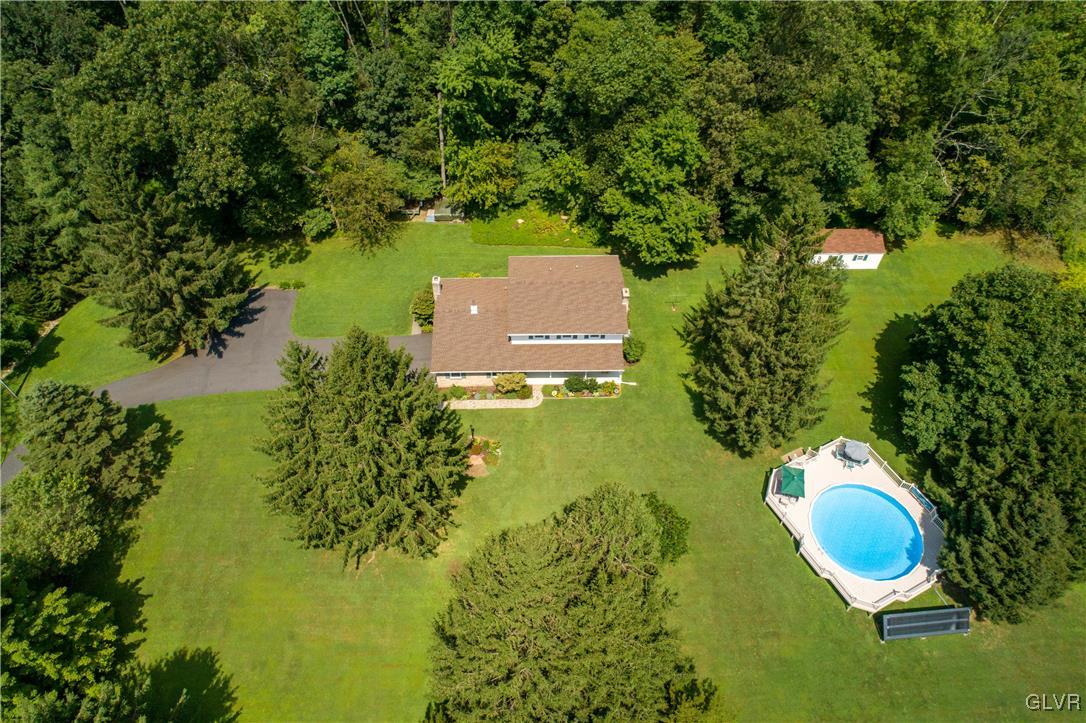 2186 East Best Road Bath, PA 18014 - Photo 9 of 40 a view of a house with a yard and a large trees