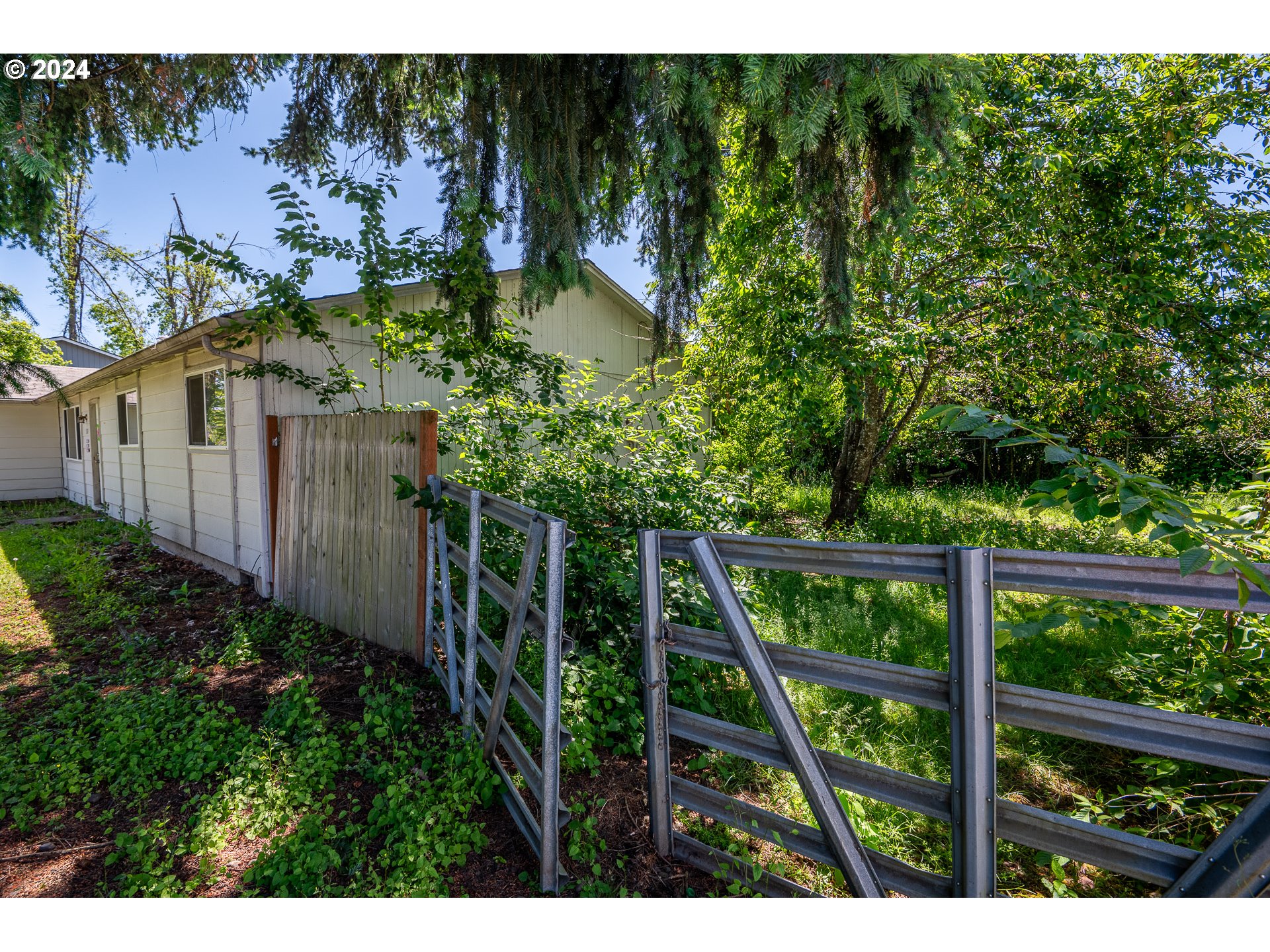 5124 E Street Springfield, OR 97478 - Photo 5 of 23 a view of statue in the garden