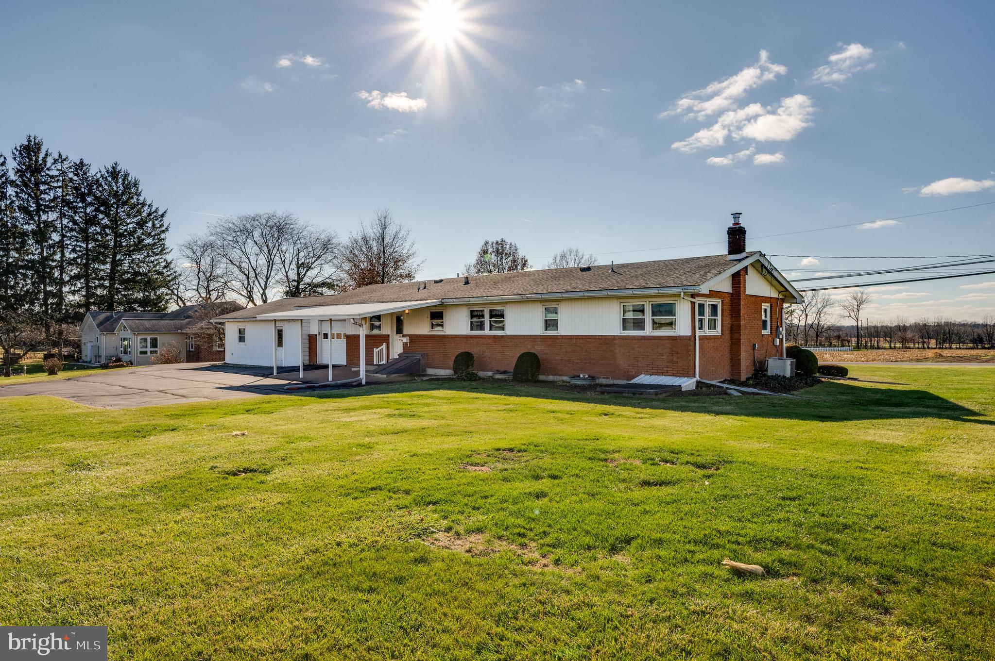 52 Crystal Cave Road Kutztown, PA 19530 - Photo 45 of 54 a front view of a house with swimming pool having outdoor seating
