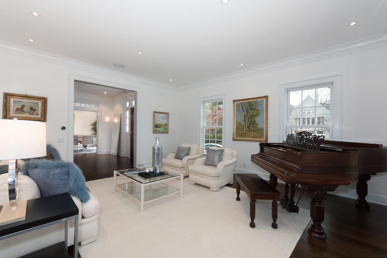 112 5 Mile River Road Darien, CT 06820 - Photo 7 of 34 a living room with furniture and a piano