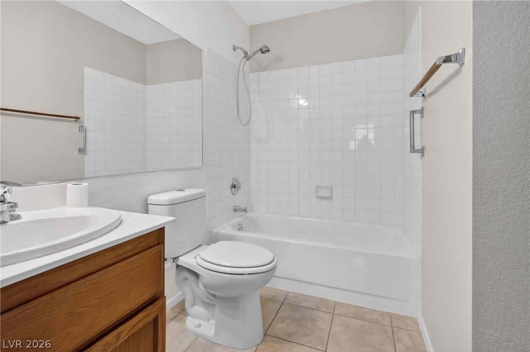 2241 Highpointe Drive, Unit 101 Laughlin, NV 89029 - Photo 18 of 23 This clean and functional bathroom features a shower-tub combination and a practical vanity area.