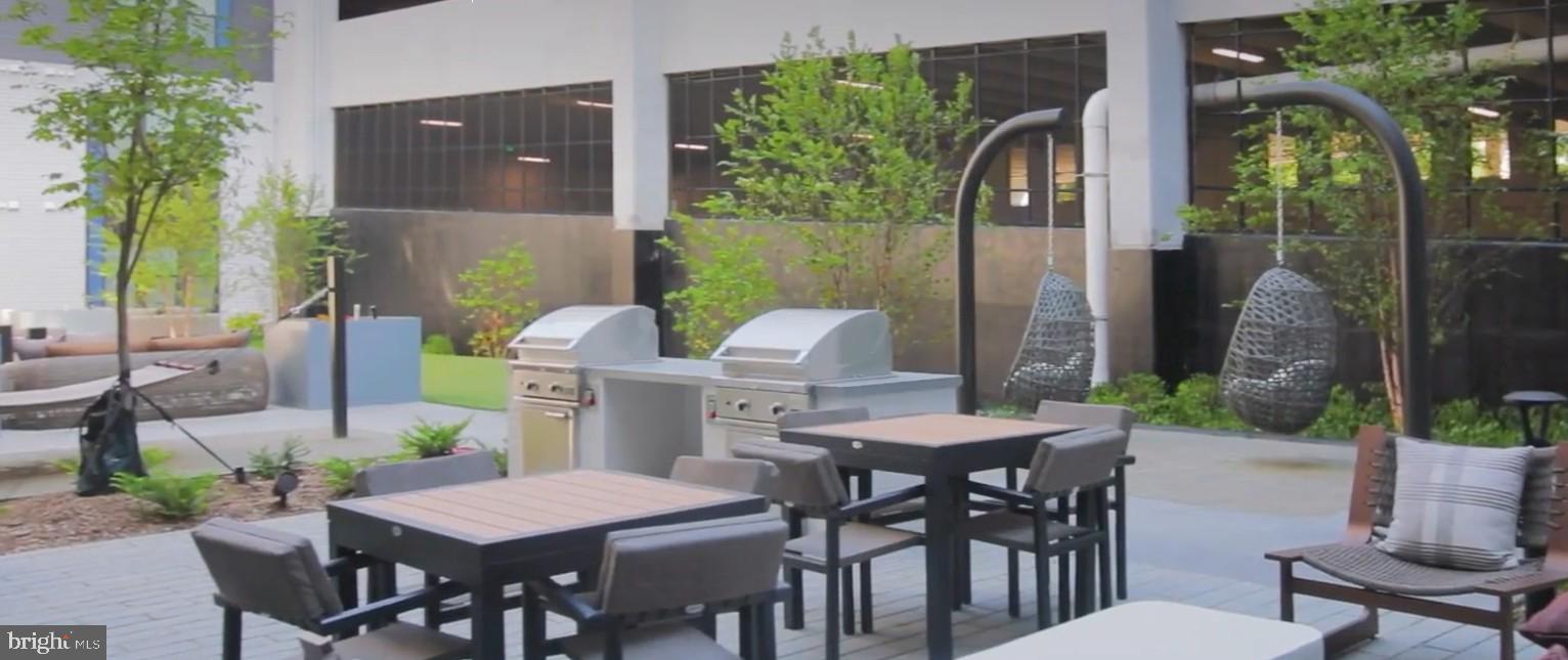 4851 Ellin Road, Unit 203 Hyattsville, MD 20784 - Photo 12 of 14 one of the many outdoor entertaining areas