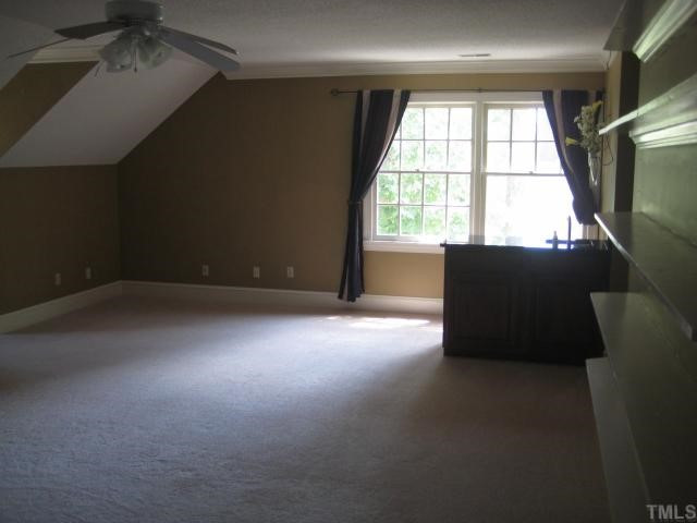 8308 Harps Mill Road Raleigh, NC 27615 - Photo 10 of 12 Second floor bonus with wet bar done in granite. Great play area for kids of all ages. Bonus Room