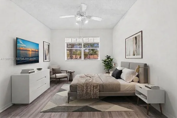 a kitchen with a refrigerator stove and cabinets