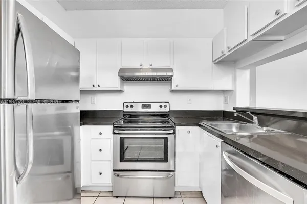 a view of a lake with a city