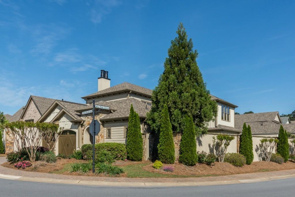 Stunning European Style Courtyard Home in upscale gated community minutes to charming Downtown Woodstock, boutique shopping, outstanding restaurants, year round entertainment, Woofstock Dog Park, Green Prints Trail System & I-575. HOA maintains front lawn & landscaping.