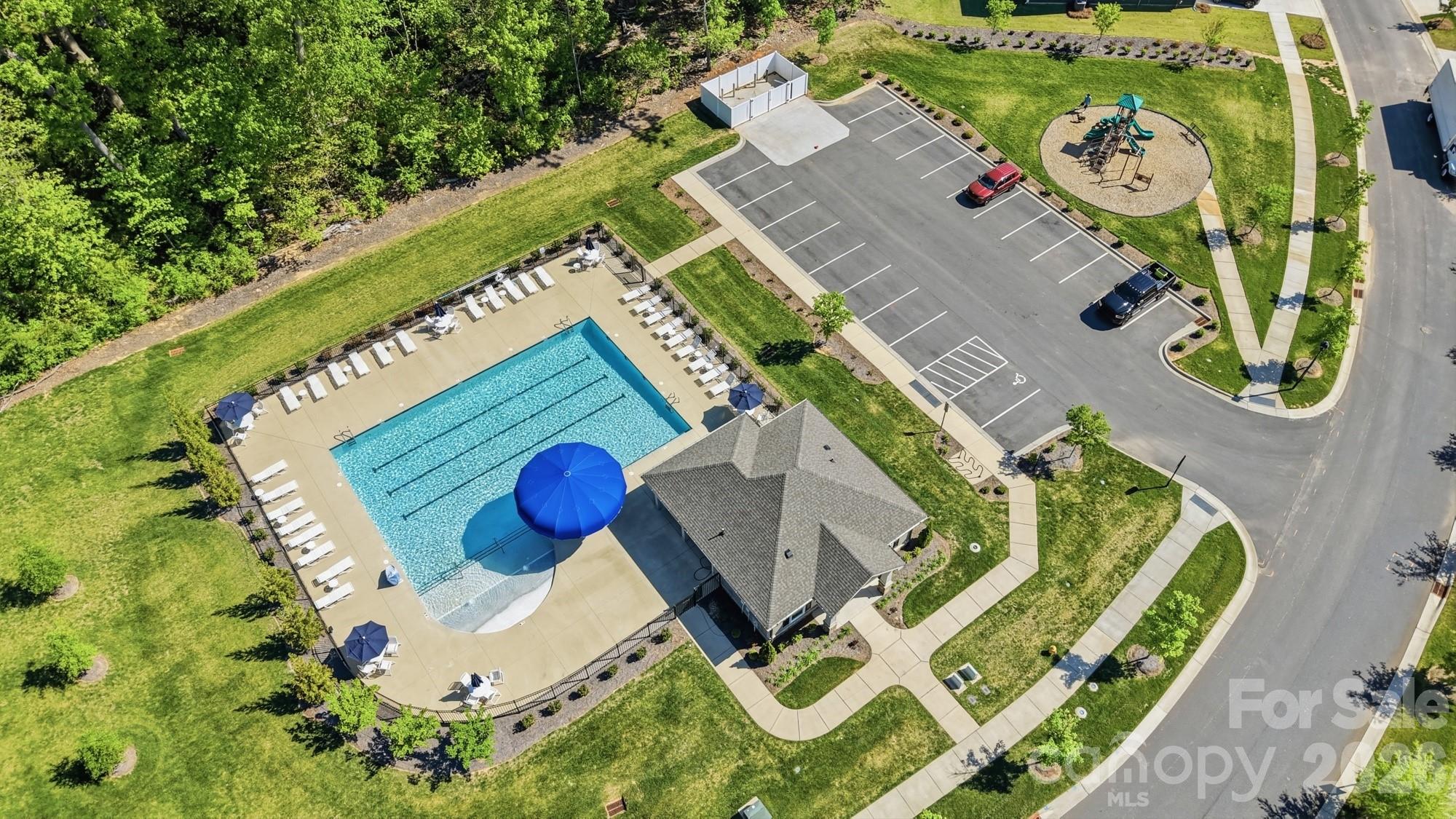 116 Timbergreen Court Troutman, NC 28166 - Photo 5 of 43 an aerial view of a house with a swimming pool