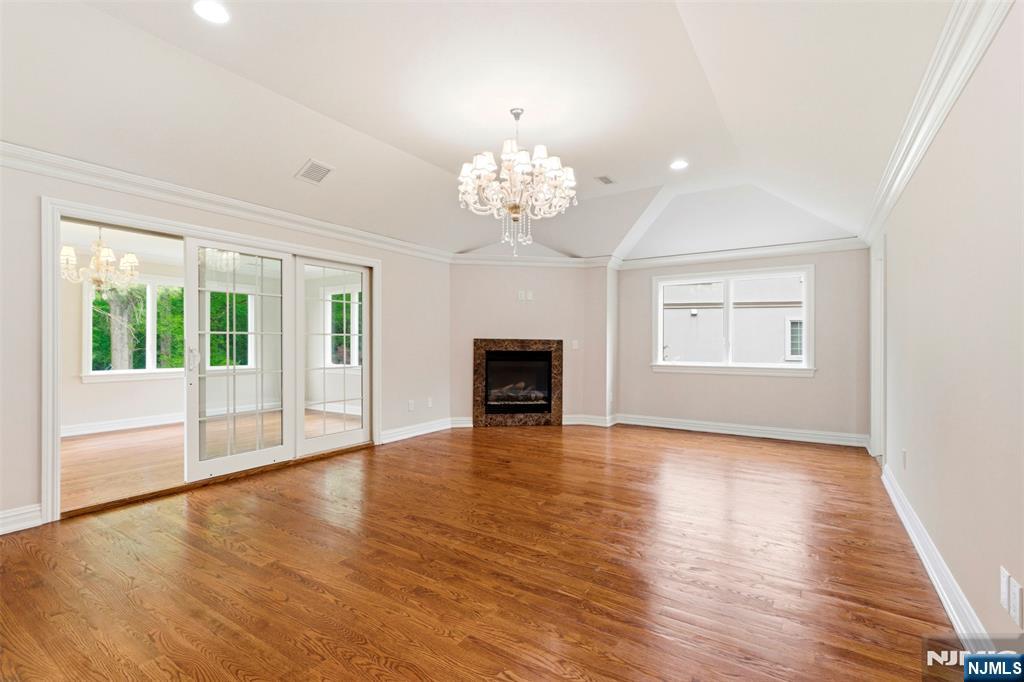 767 Orangeburgh Road River Vale, NJ 07675 - Photo 33 of 49 a view of an empty room with wooden floor and a window