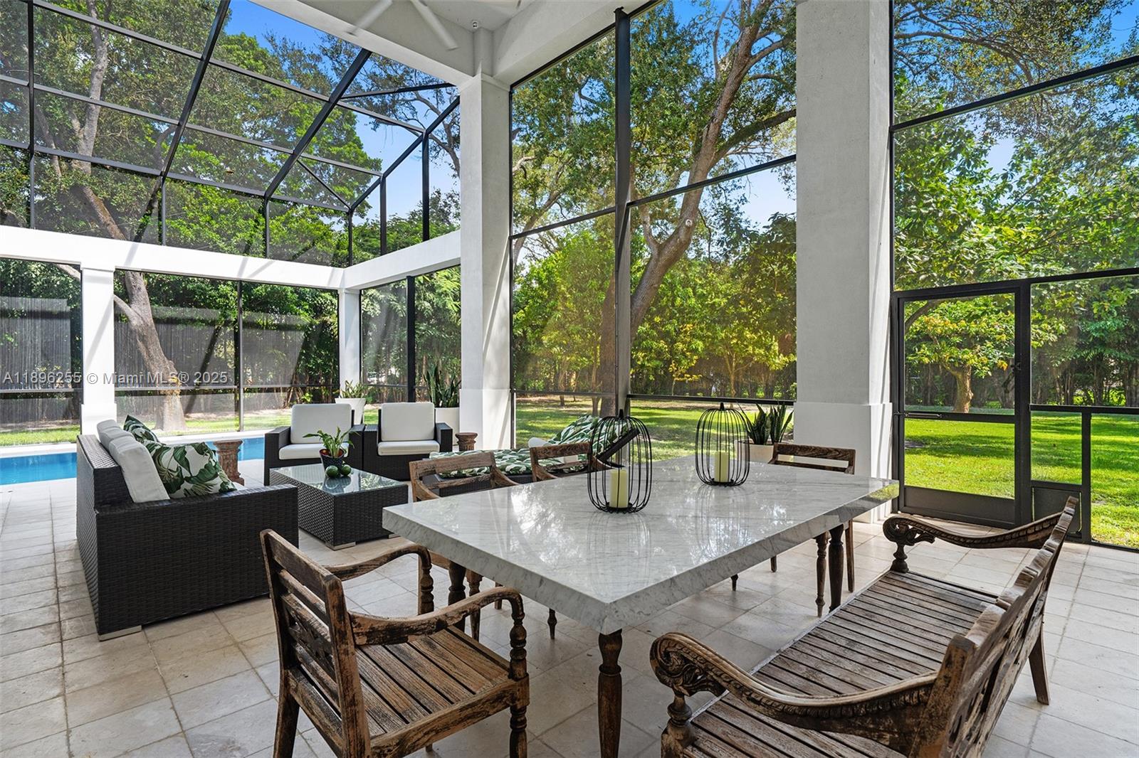 8923 Ludlam Road Pinecrest, FL 33156 - Photo 24 of 69 a view of an outdoor space with seating area