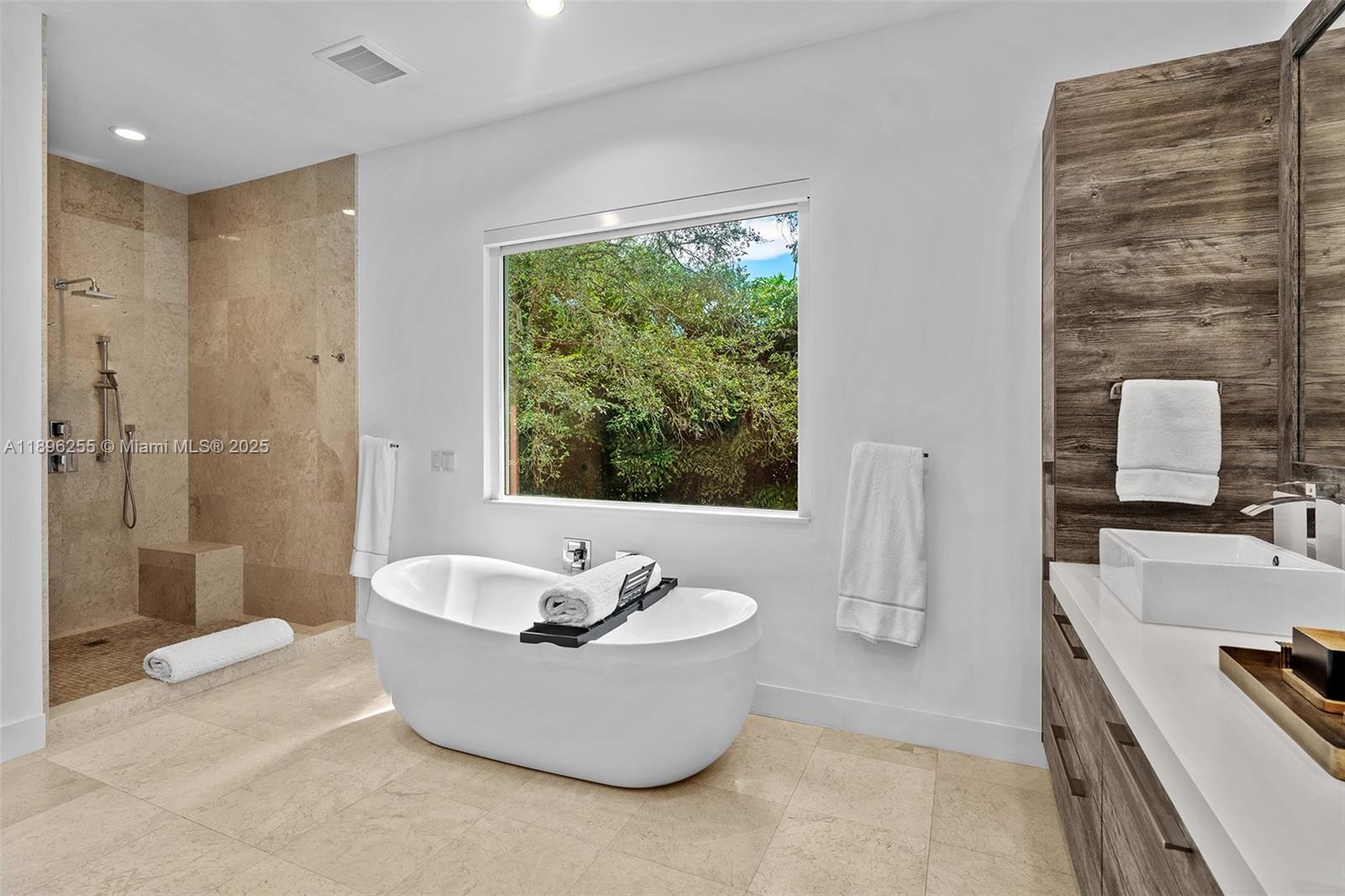 8923 Ludlam Road Pinecrest, FL 33156 - Photo 36 of 69 a living room with a couch and a sink