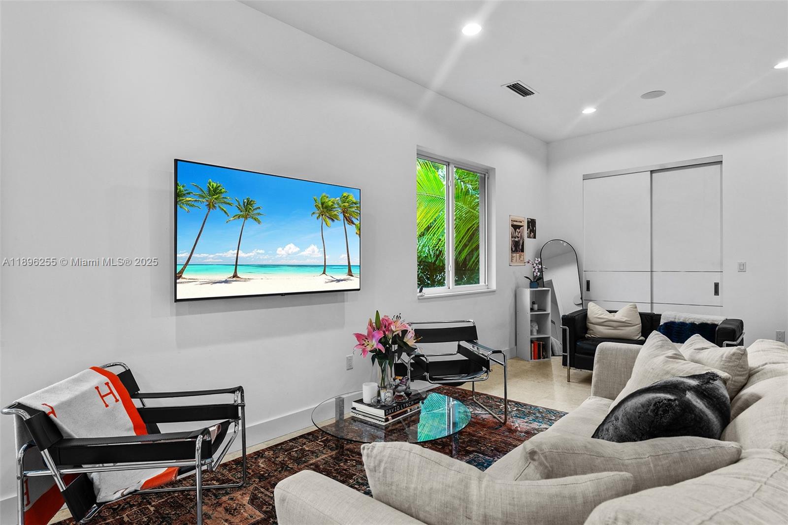 8923 Ludlam Road Pinecrest, FL 33156 - Photo 50 of 69 a living room with furniture and a large window