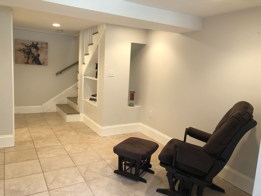 57 Middle Road Amesbury, MA 01913 - Photo 18 of 20 a bathroom with a sink a toilet and a tub