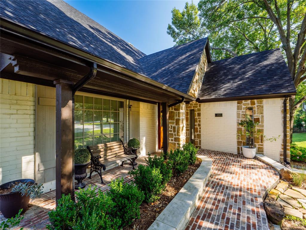 153 Meadowcreek Road Coppell, TX 75019 - Photo 3 of 35 a porch with seating space