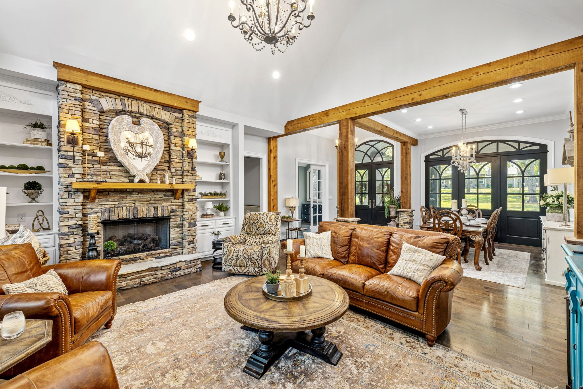 74 Pine Lake Road Summertown, TN 38483 - Photo 12 of 90 a living room with furniture a fireplace and a large window