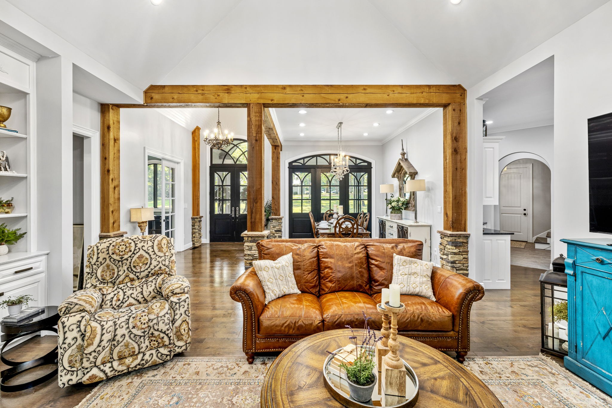 74 Pine Lake Road Summertown, TN 38483 - Photo 13 of 90 a living room with furniture a fireplace and large windows