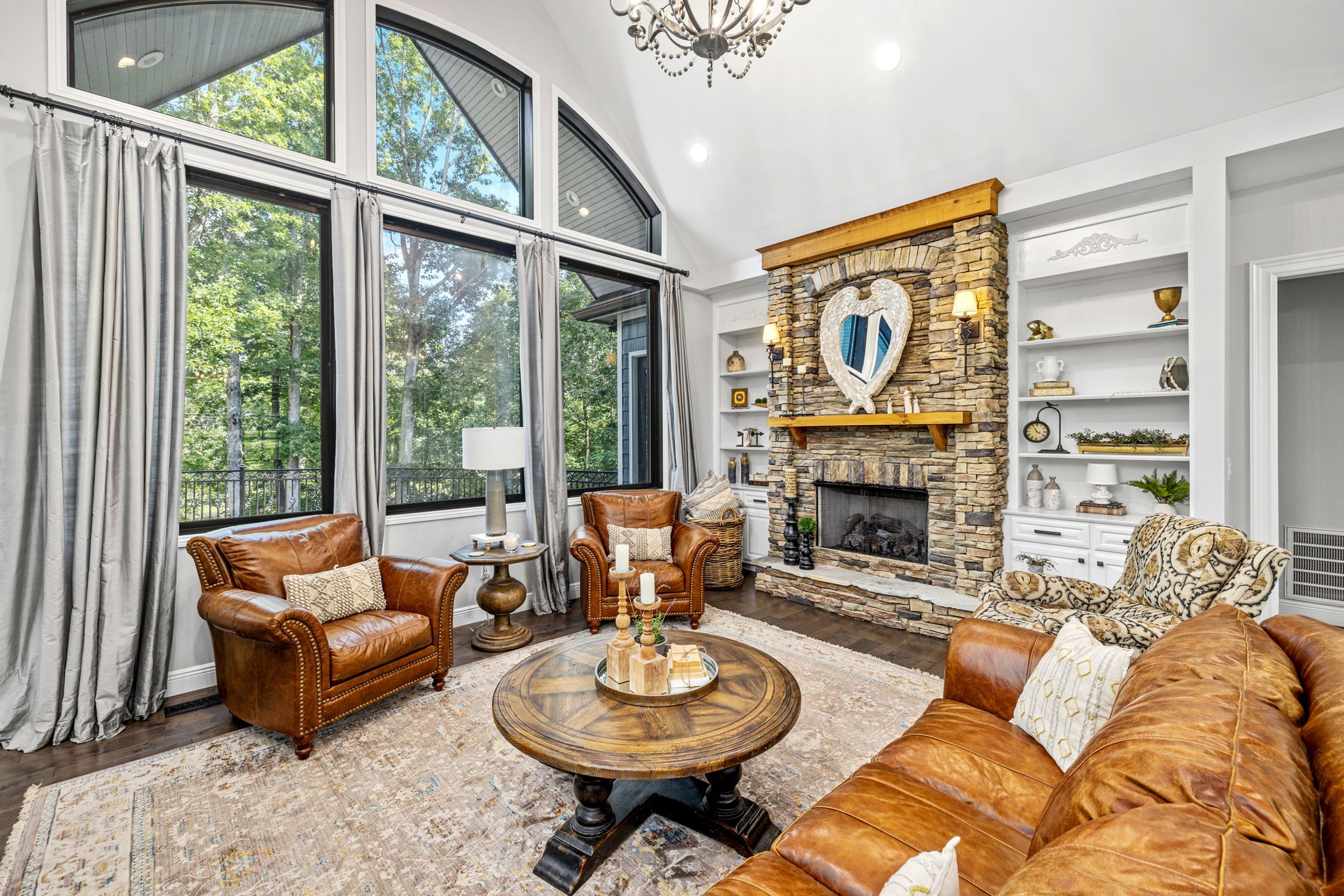 74 Pine Lake Road Summertown, TN 38483 - Photo 14 of 90 a living room with furniture a fireplace and a large window