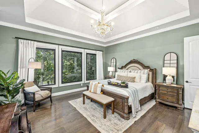 a kitchen with granite countertop a sink a counter space appliances and cabinets