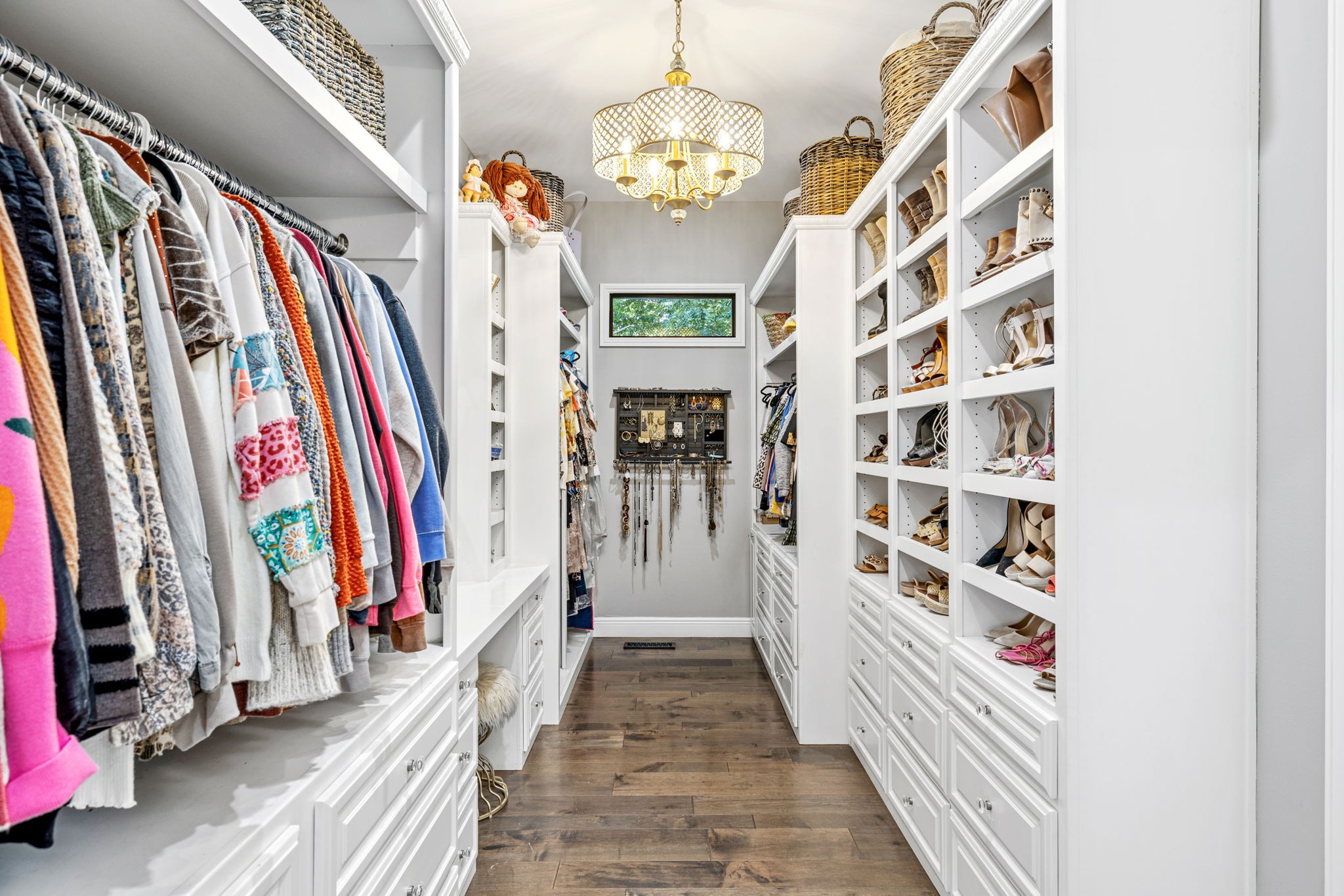 74 Pine Lake Road Summertown, TN 38483 - Photo 36 of 90 a view of a hallway with a flower pot and a bookshelf