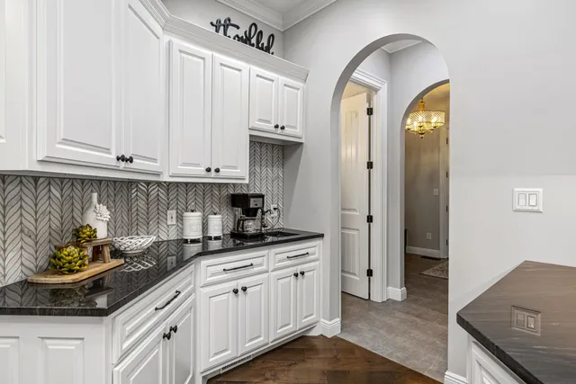 a view of balcony with wooden floor and fence