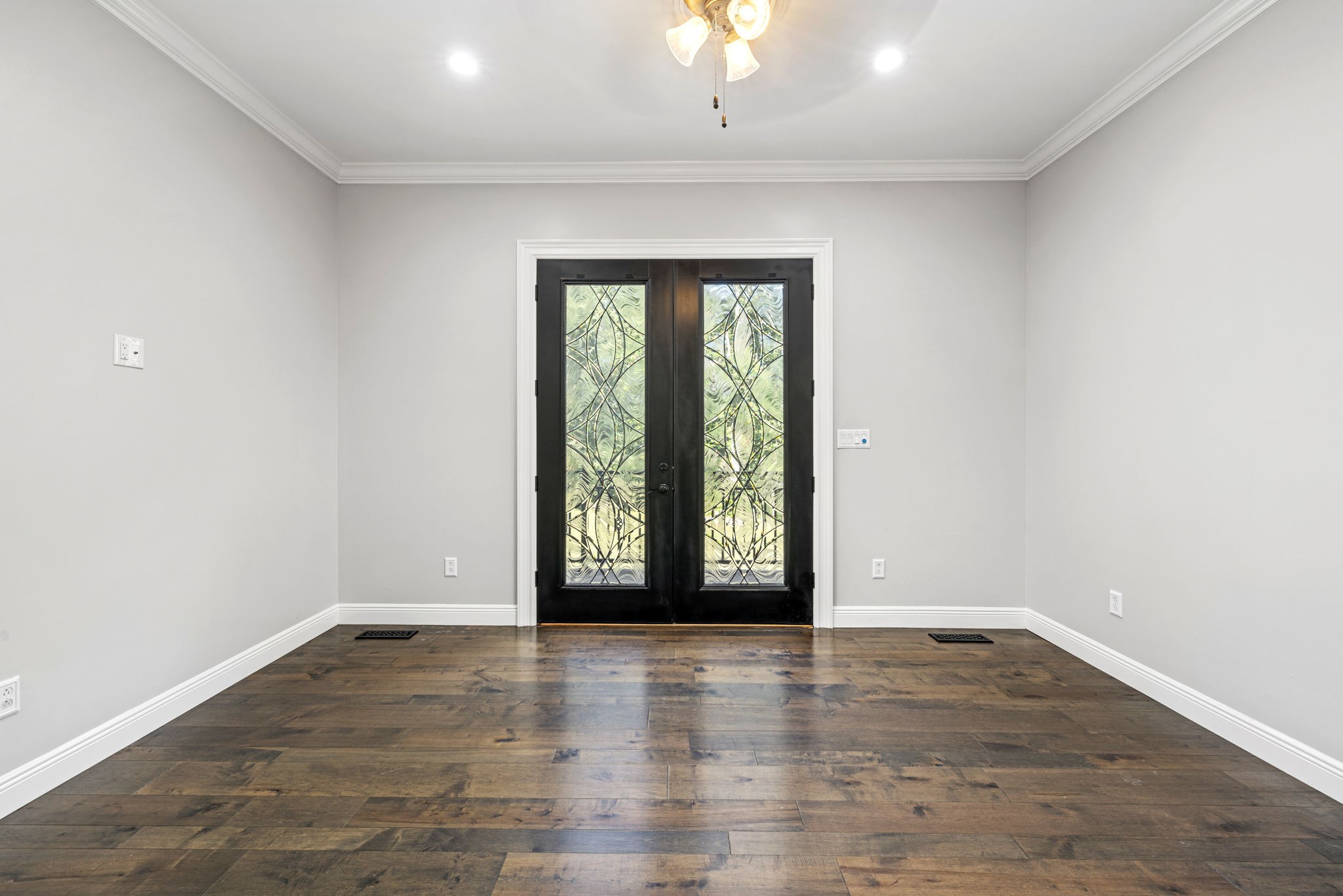 74 Pine Lake Road Summertown, TN 38483 - Photo 48 of 90 an empty room with wooden floor and windows
