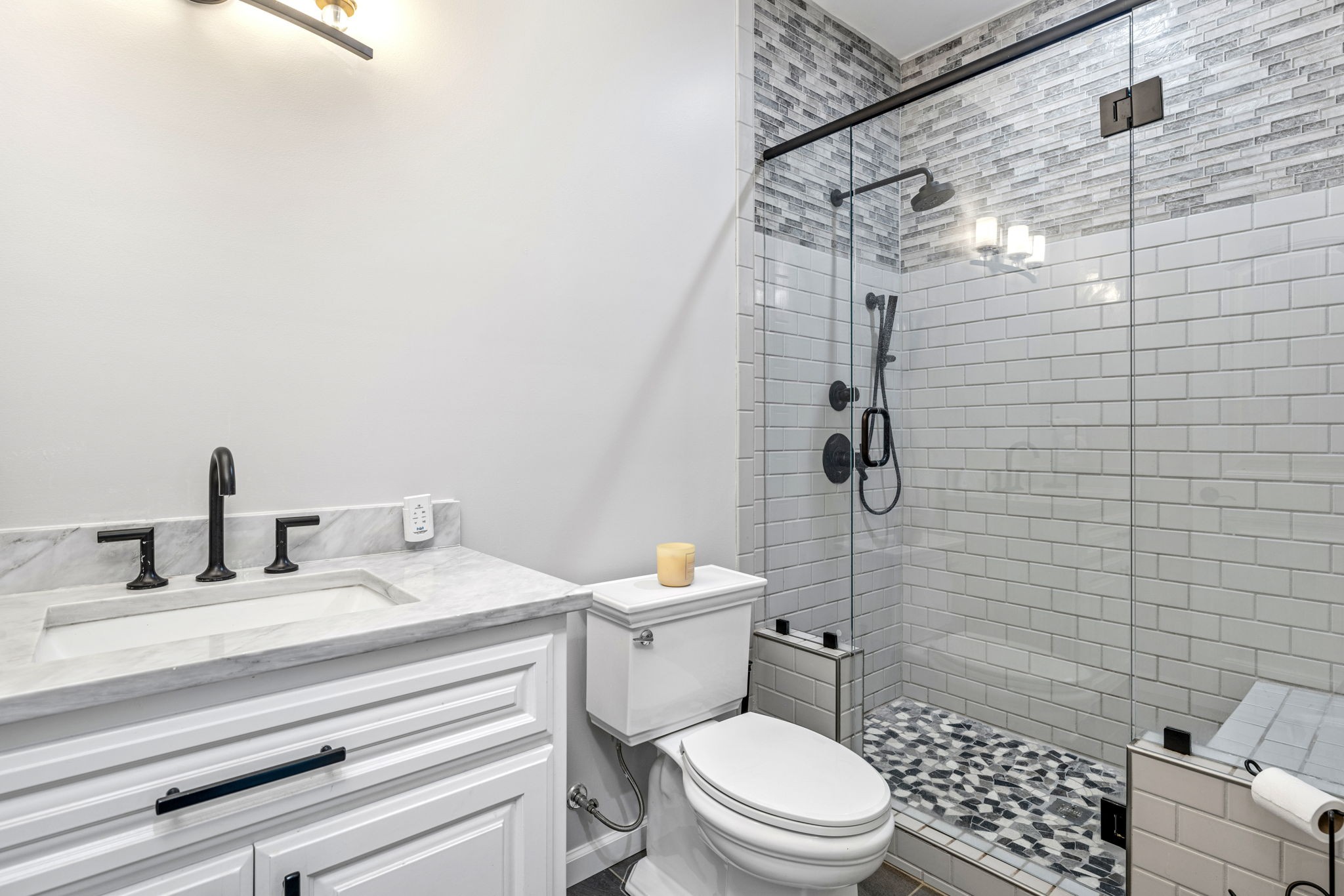 74 Pine Lake Road Summertown, TN 38483 - Photo 60 of 90 a bathroom with a sink a toilet and shower