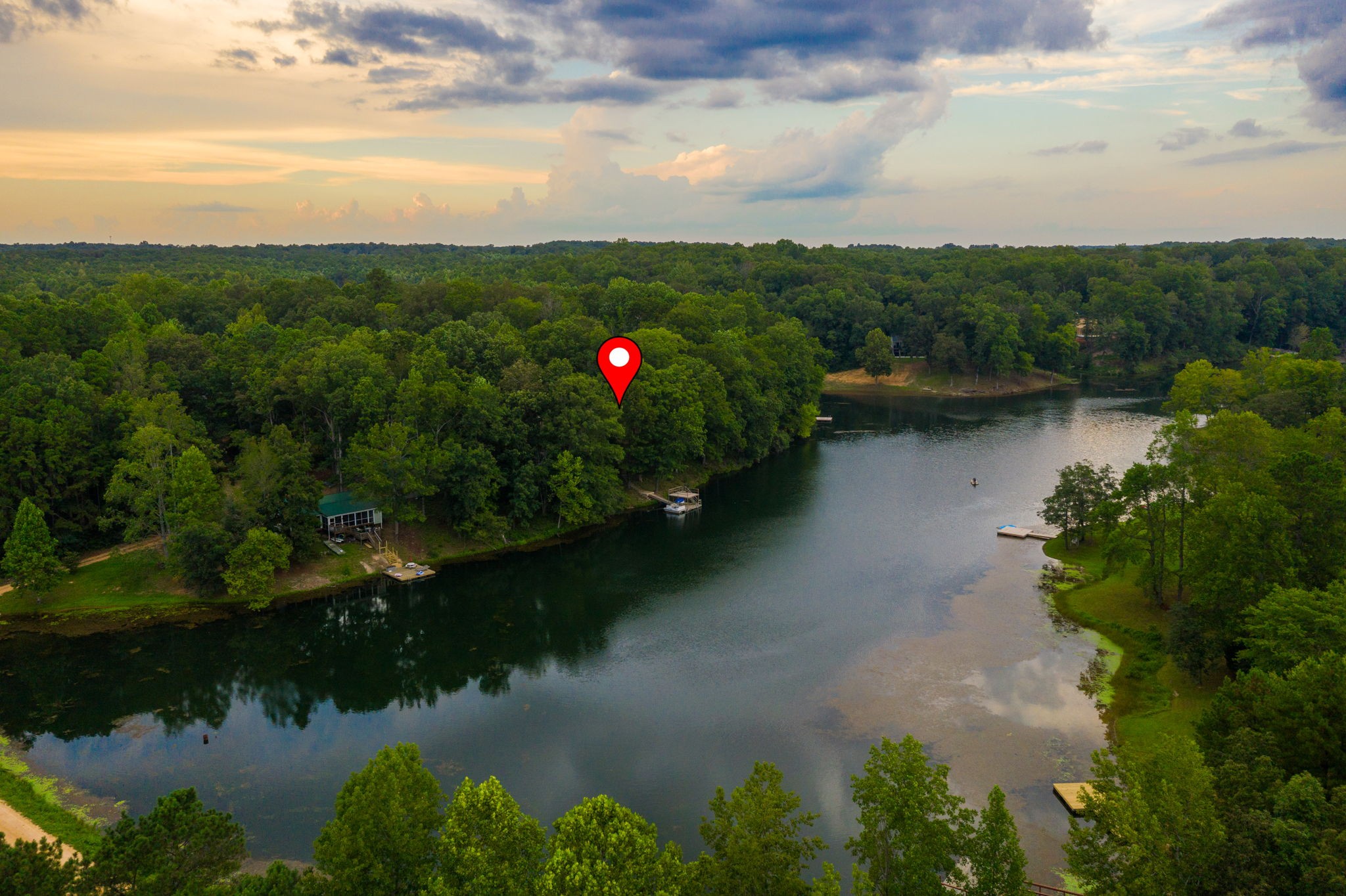 74 Pine Lake Road Summertown, TN 38483 - Photo 87 of 90 a view of a lake with a city