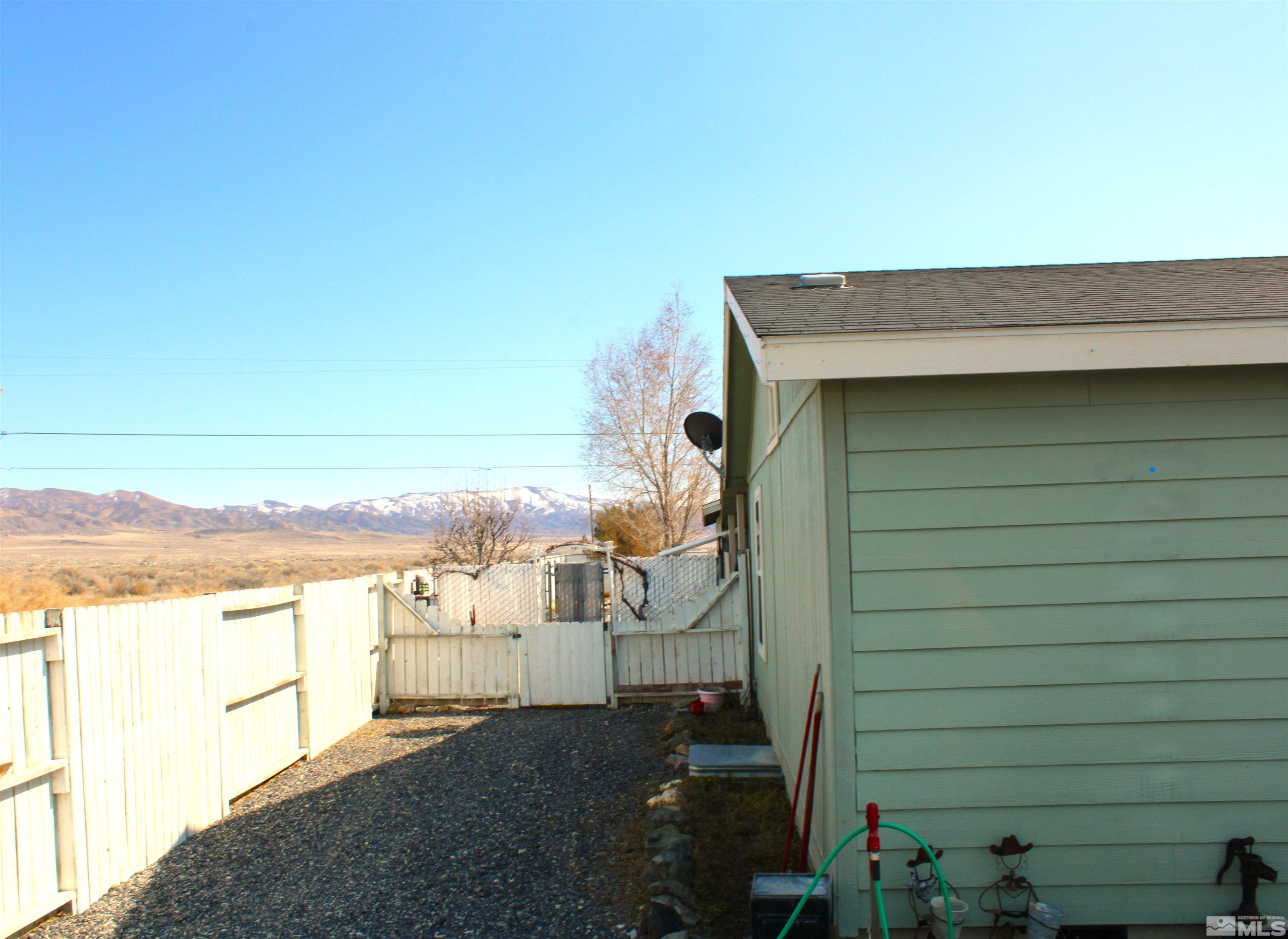290 Reservoir Road Lovelock, NV 89419 - Photo 5 of 15 a view of a room with many windows