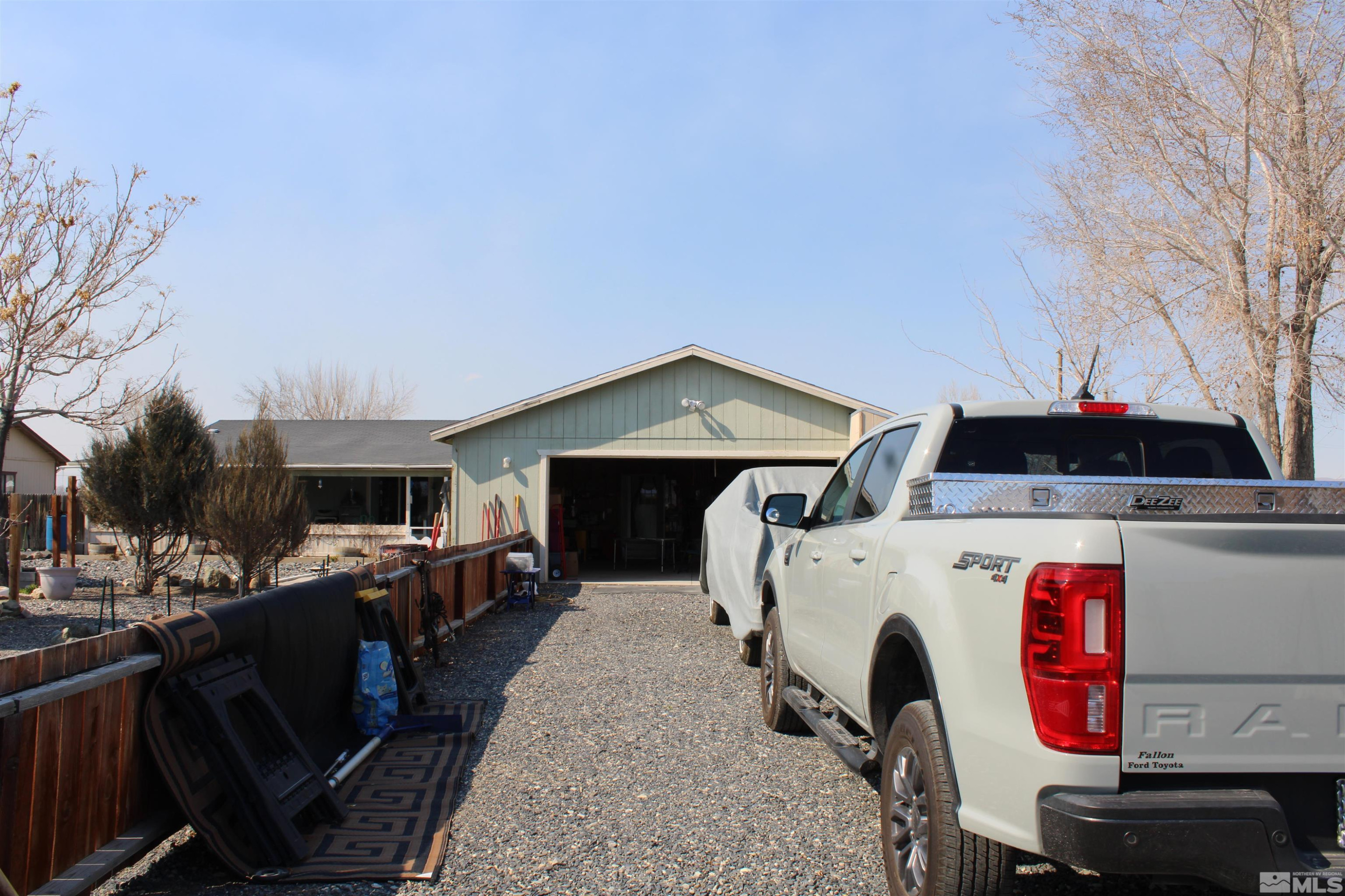 290 Reservoir Road Lovelock, NV 89419 - Photo 9 of 15 a view of a house with cars parked