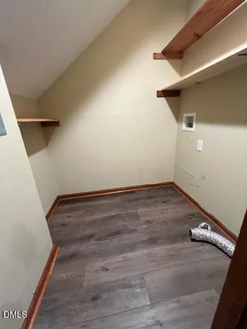 a view of balcony with wooden floor