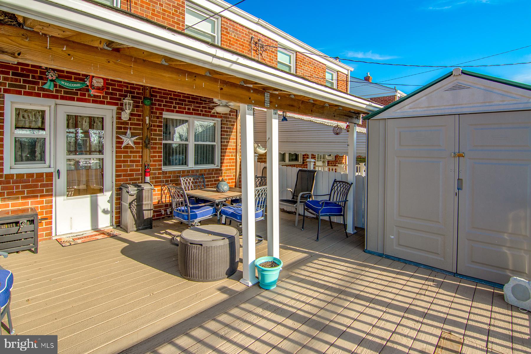 7633 Charlesmont Road Baltimore, MD 21222 - Photo 26 of 28 Very nice covered rear deck