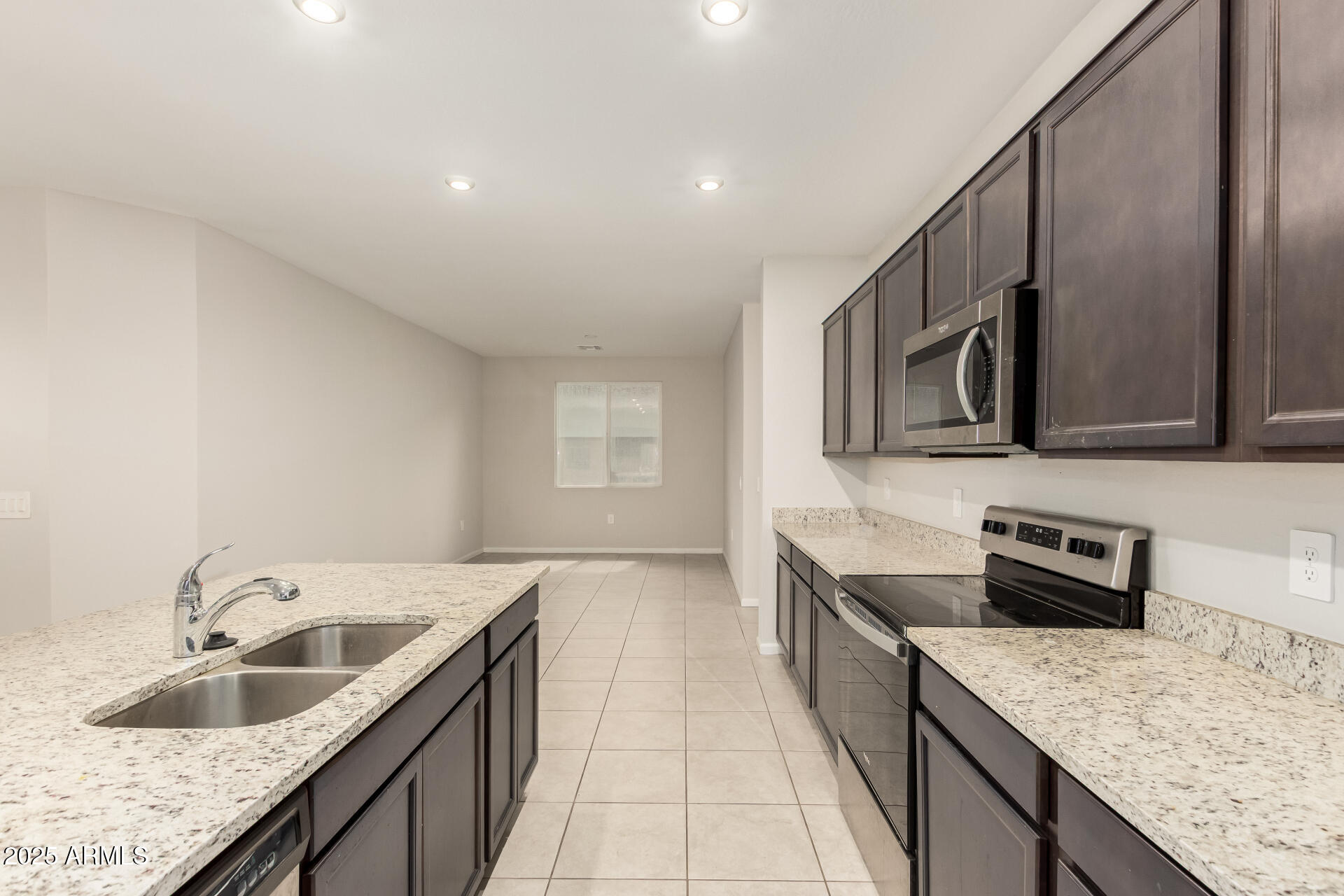 4677 South Siphon Draw Road Apache Junction, AZ 85119 - Photo 12 of 45 a kitchen with a sink stove top oven and microwave