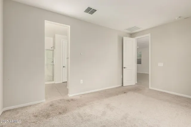 a view of a room with a large window