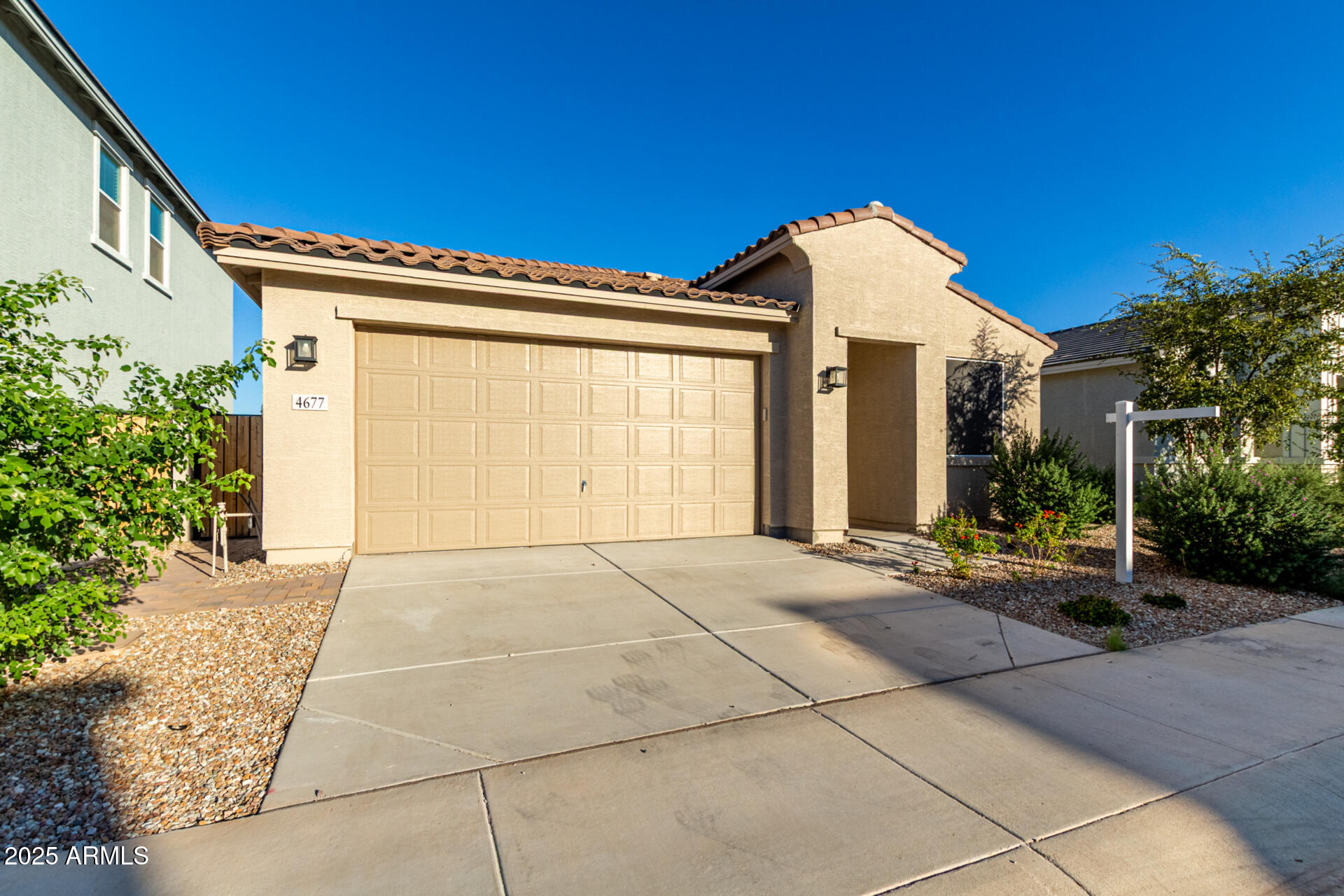 4677 South Siphon Draw Road Apache Junction, AZ 85119 - Photo 34 of 45 a view of a house with a backyard and potted plants
