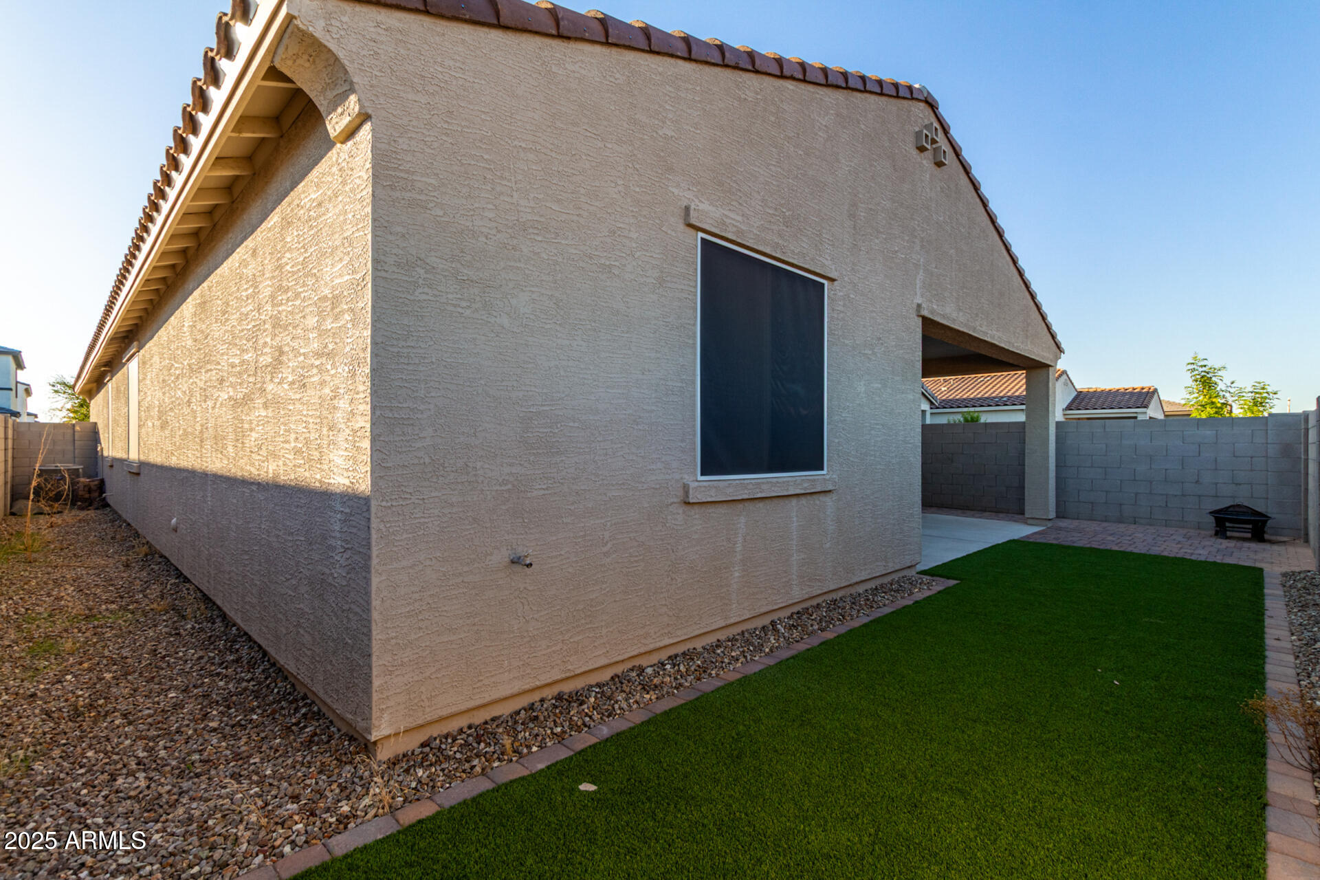 4677 South Siphon Draw Road Apache Junction, AZ 85119 - Photo 40 of 45 a backyard of a house with table and chairs