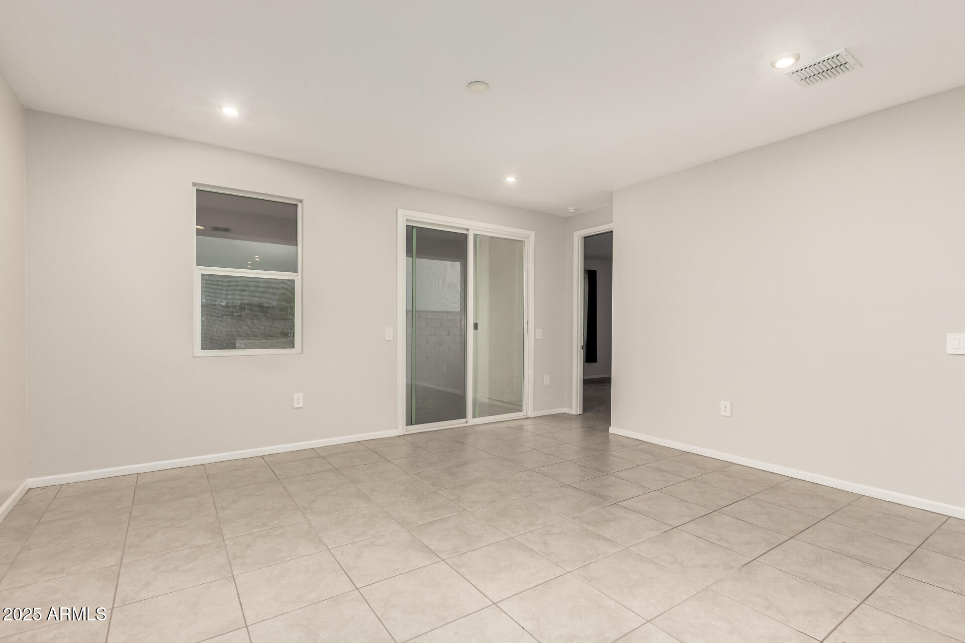 4677 South Siphon Draw Road Apache Junction, AZ 85119 - Photo 8 of 45 an empty room with windows