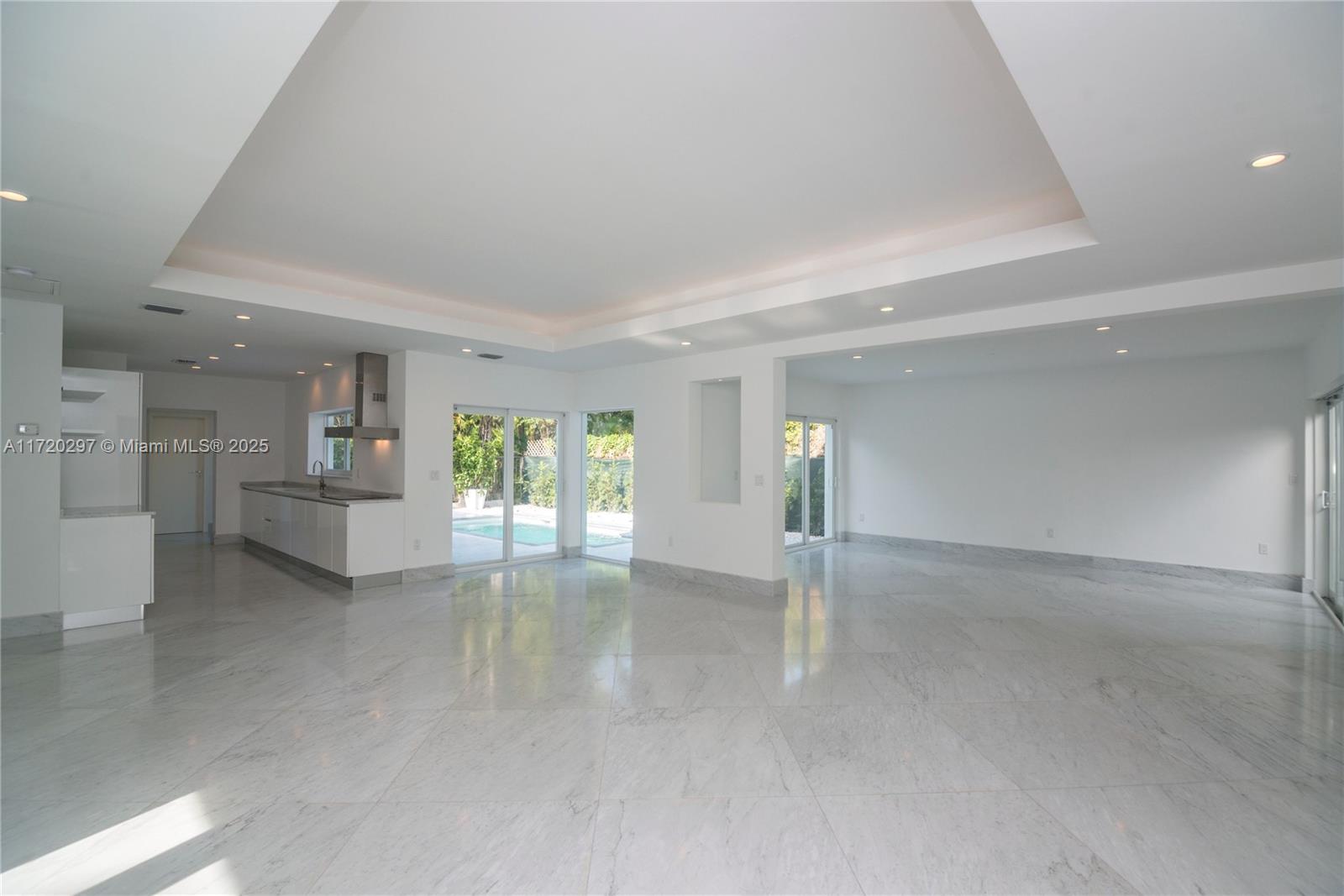 4500 Alton Road Miami Beach, FL 33140 - Photo 13 of 32 a view of empty room with a fireplace