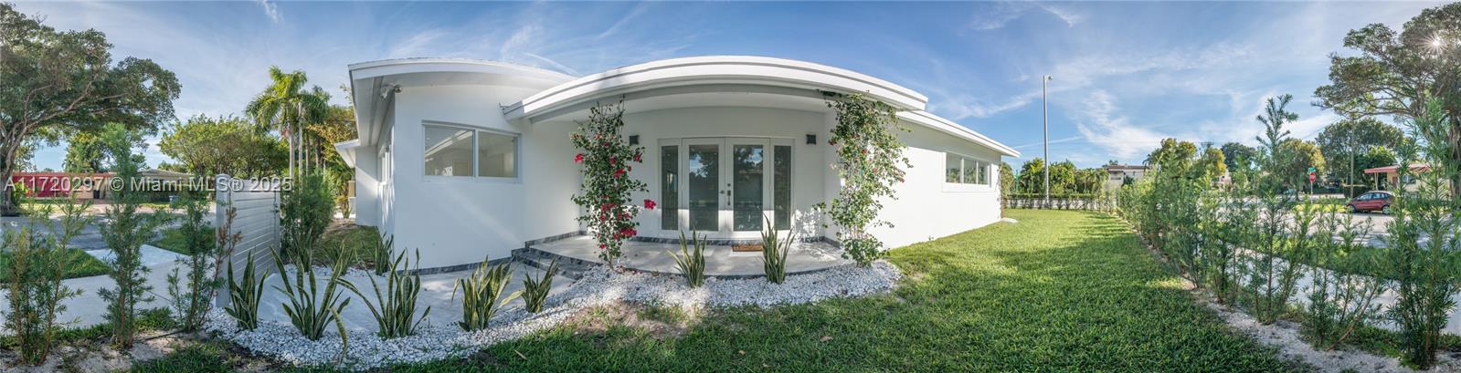 4500 Alton Road Miami Beach, FL 33140 - Photo 2 of 32 a view of a house with a small yard