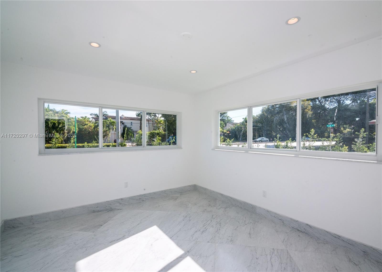 4500 Alton Road Miami Beach, FL 33140 - Photo 22 of 32 a view of an empty room with a window