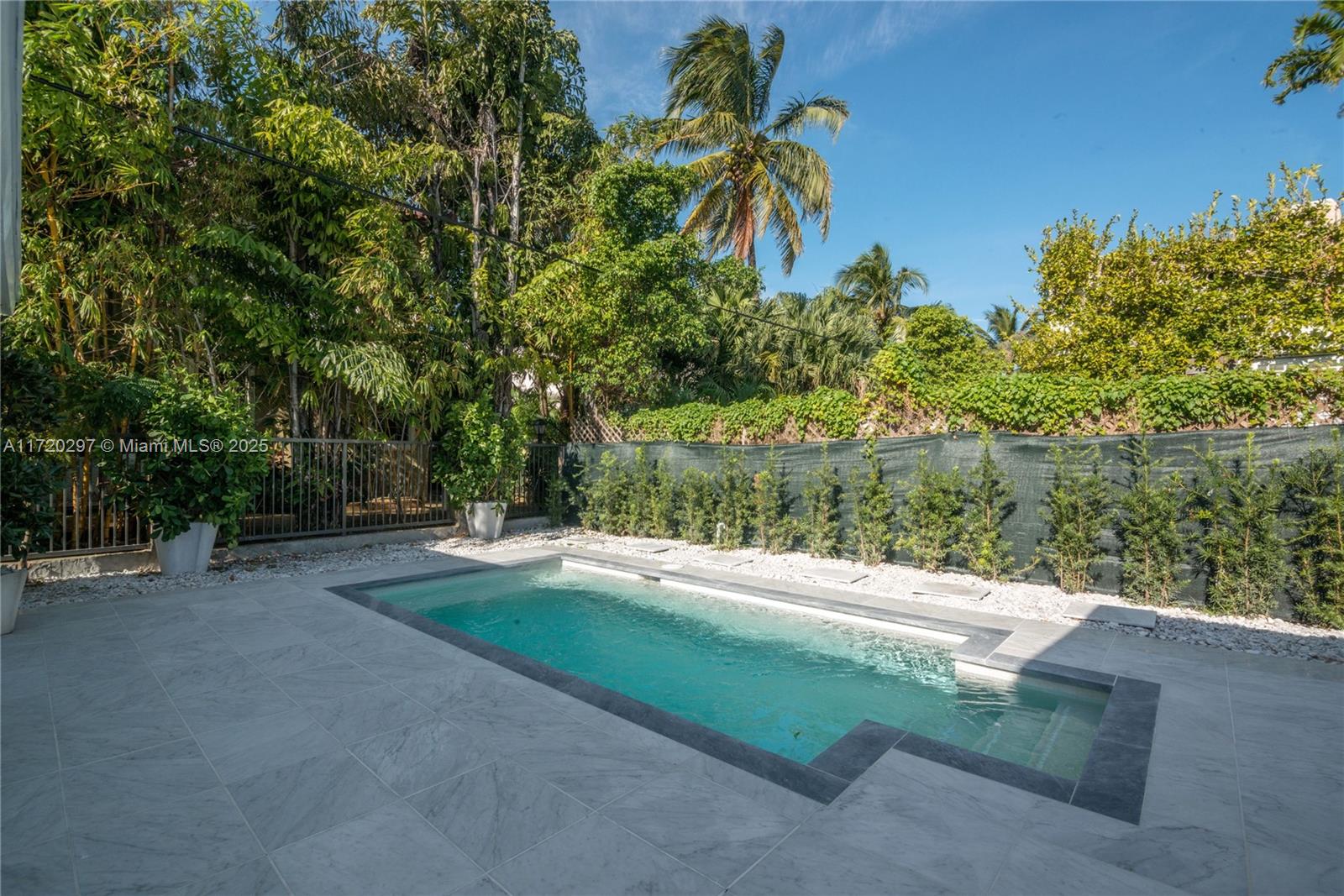 4500 Alton Road Miami Beach, FL 33140 - Photo 9 of 32 a view of backyard with green space
