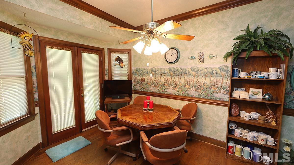7943 Footman Way Raleigh, NC 27615 - Photo 6 of 11 a living room with furniture and a window