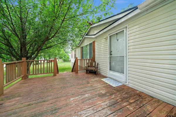 a view of a backyard with a small cabin